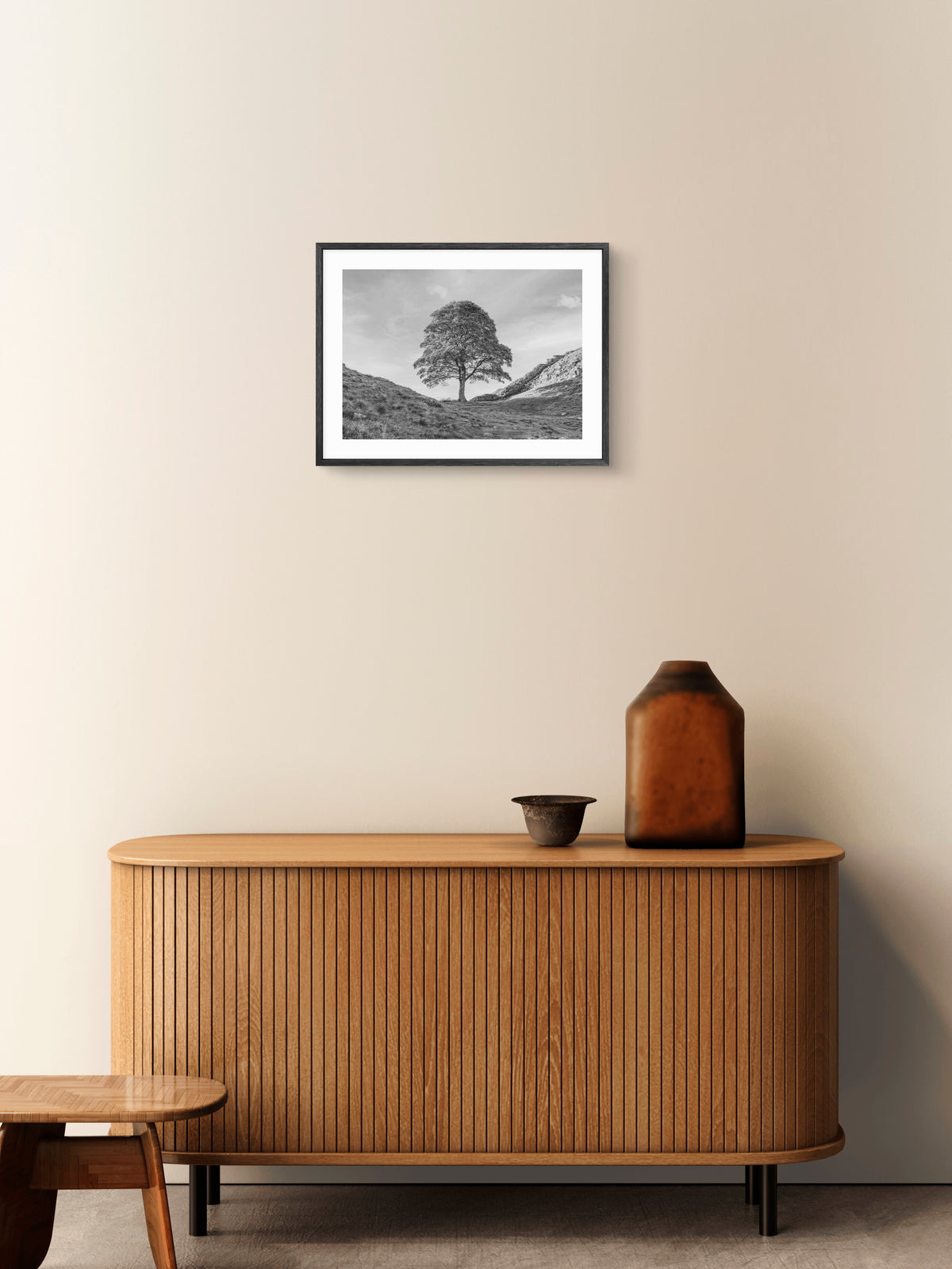 Sycamore Gap Tree - Northumberland - Black and White wall art displayed in a styled room setting.