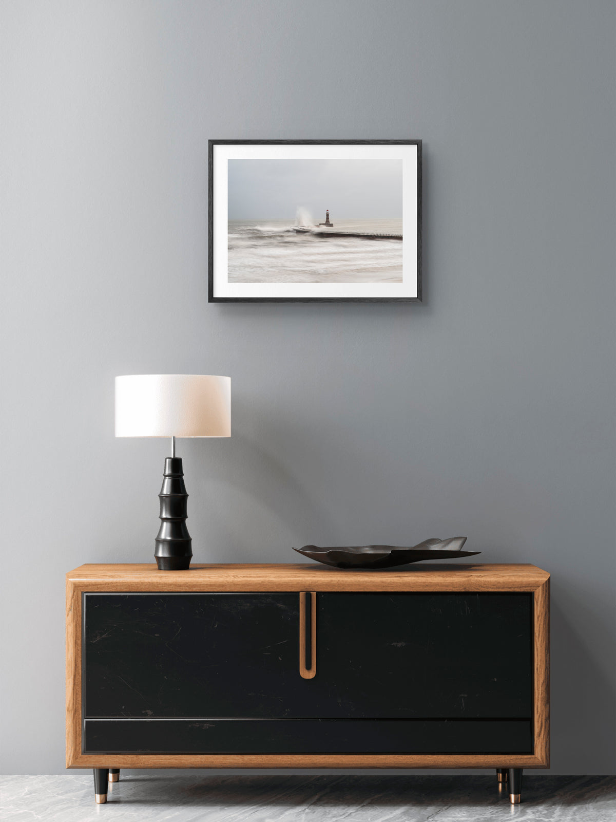 Roker Pier - Stormy Seas - Sunderland wall art displayed in a styled room setting.