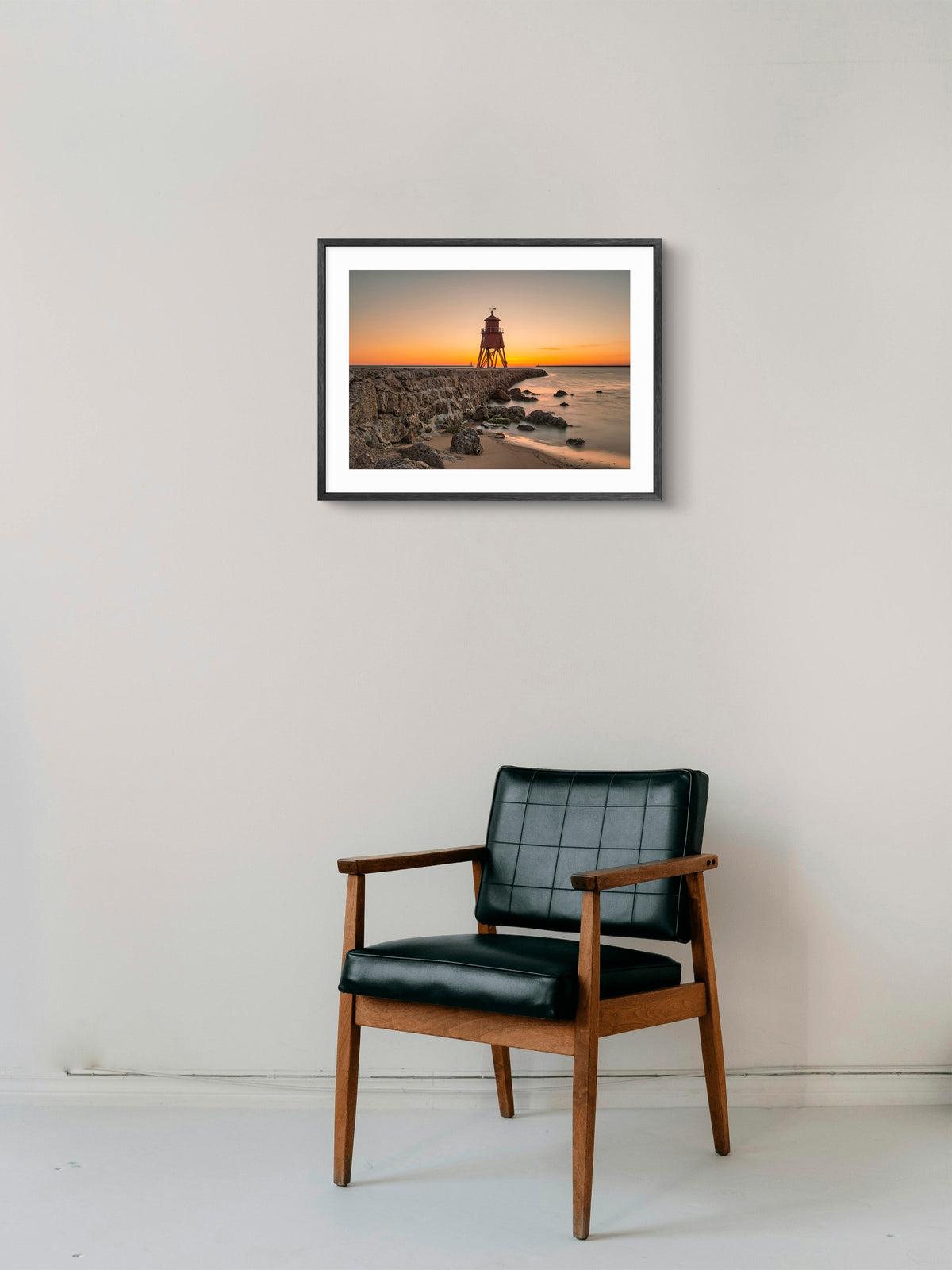Herd Groyne Lighthouse - Golden Sunrise - South Shield wall art displayed in a styled room setting.