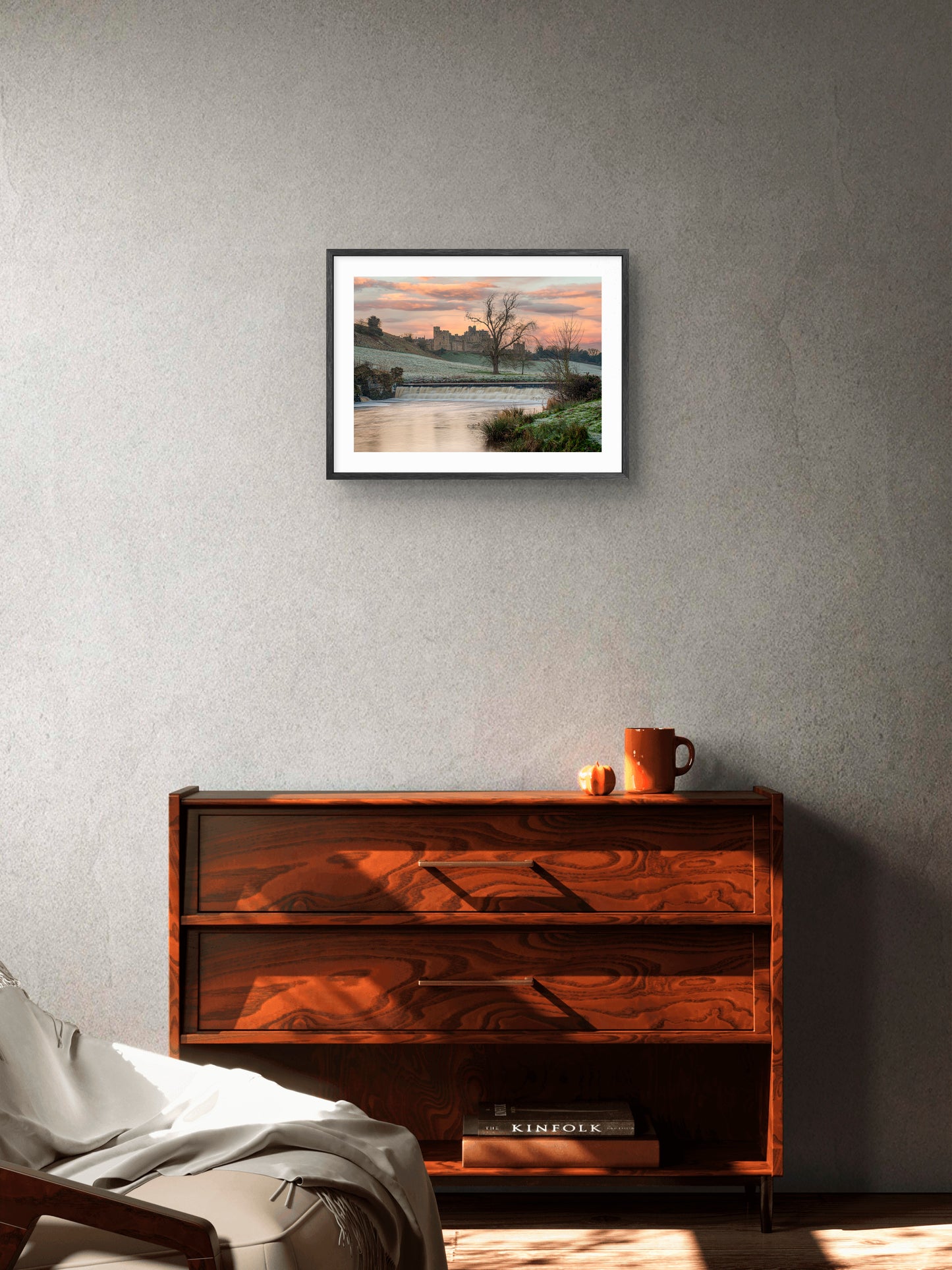 Alnwick Castle winter wall art displayed above a sideboard in a room setting.