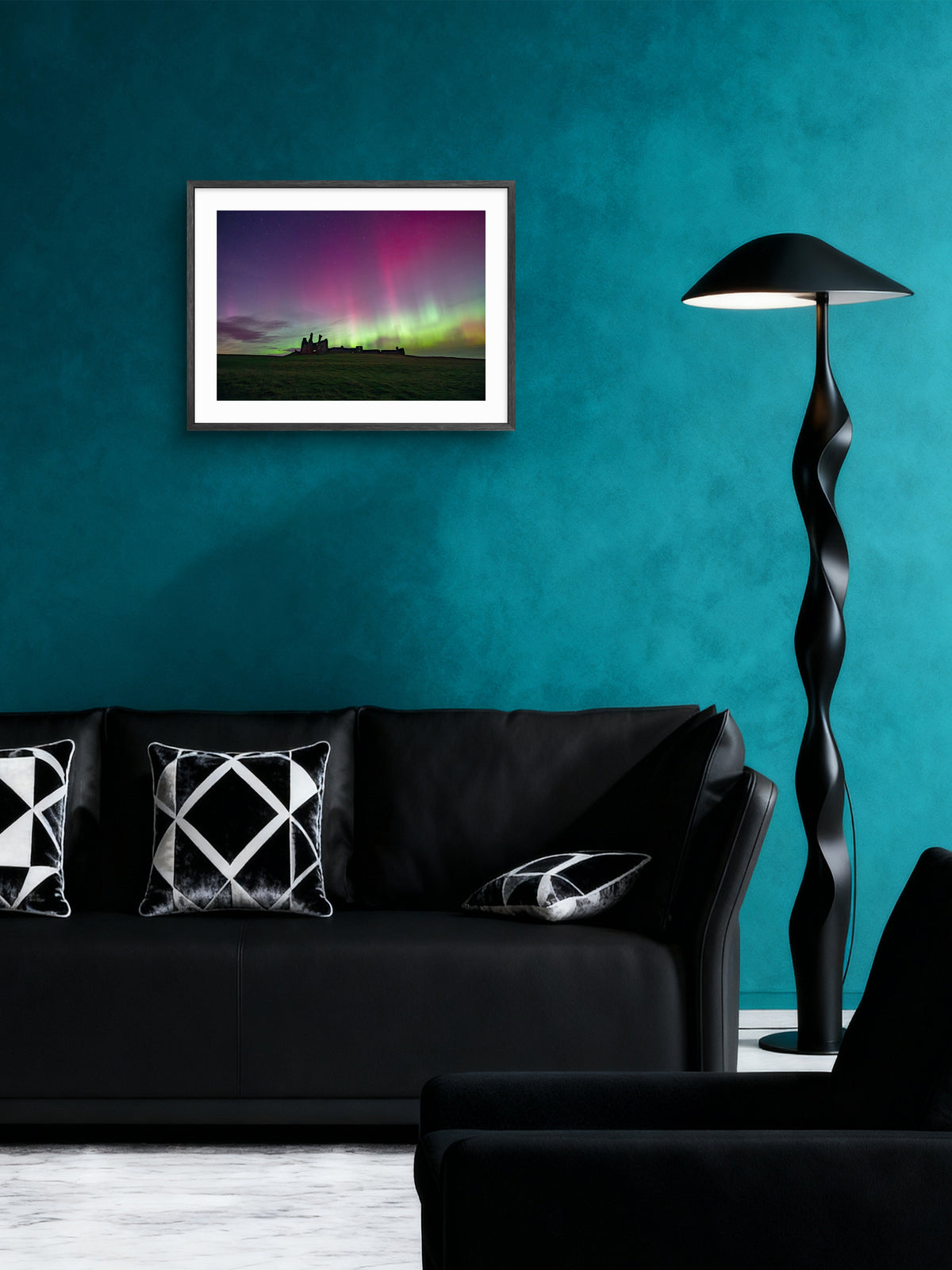 Northern Lights above Dunstanburgh Castle wall art displayed in a styled room setting.