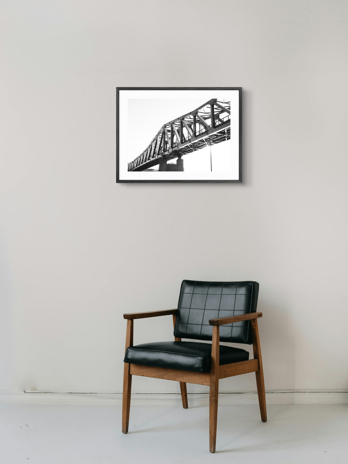 Queen Elizabeth II Metro Bridge - Newcastle Gateshead - Black and White wall art displayed in a styled room setting.