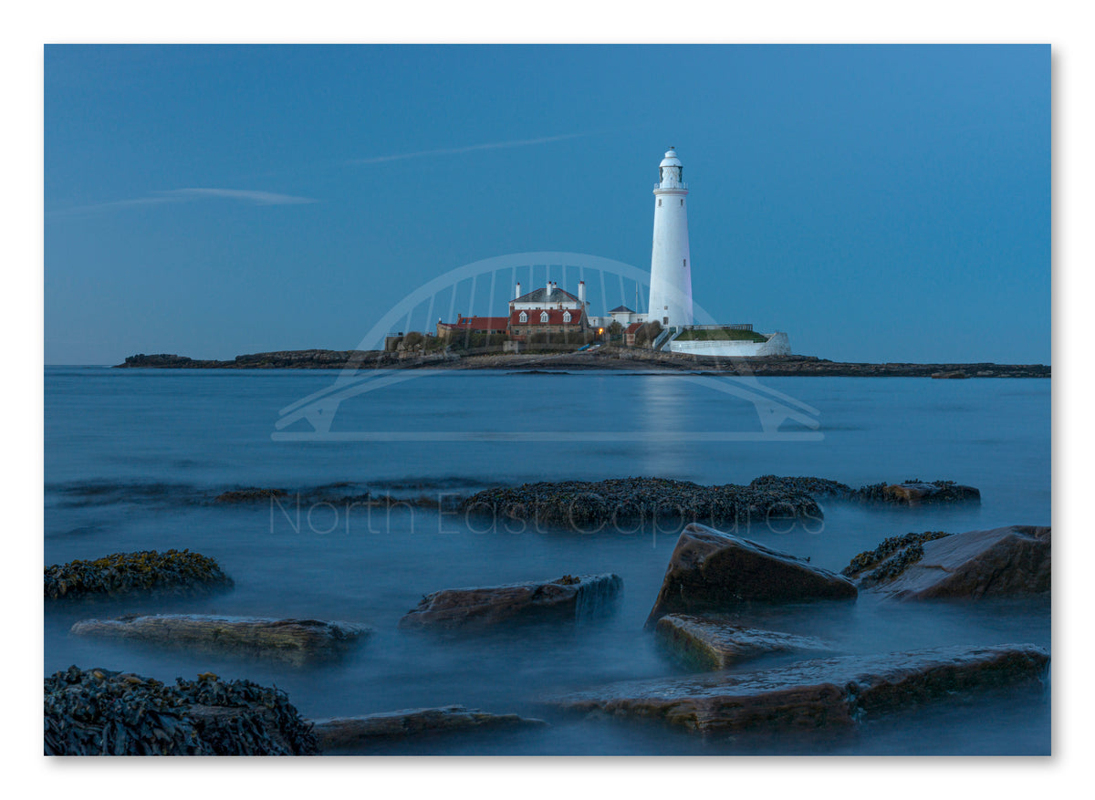St Mary's Lighthouse and Rocks - Blue Hour - Whitley Bay shown as a canvas print.