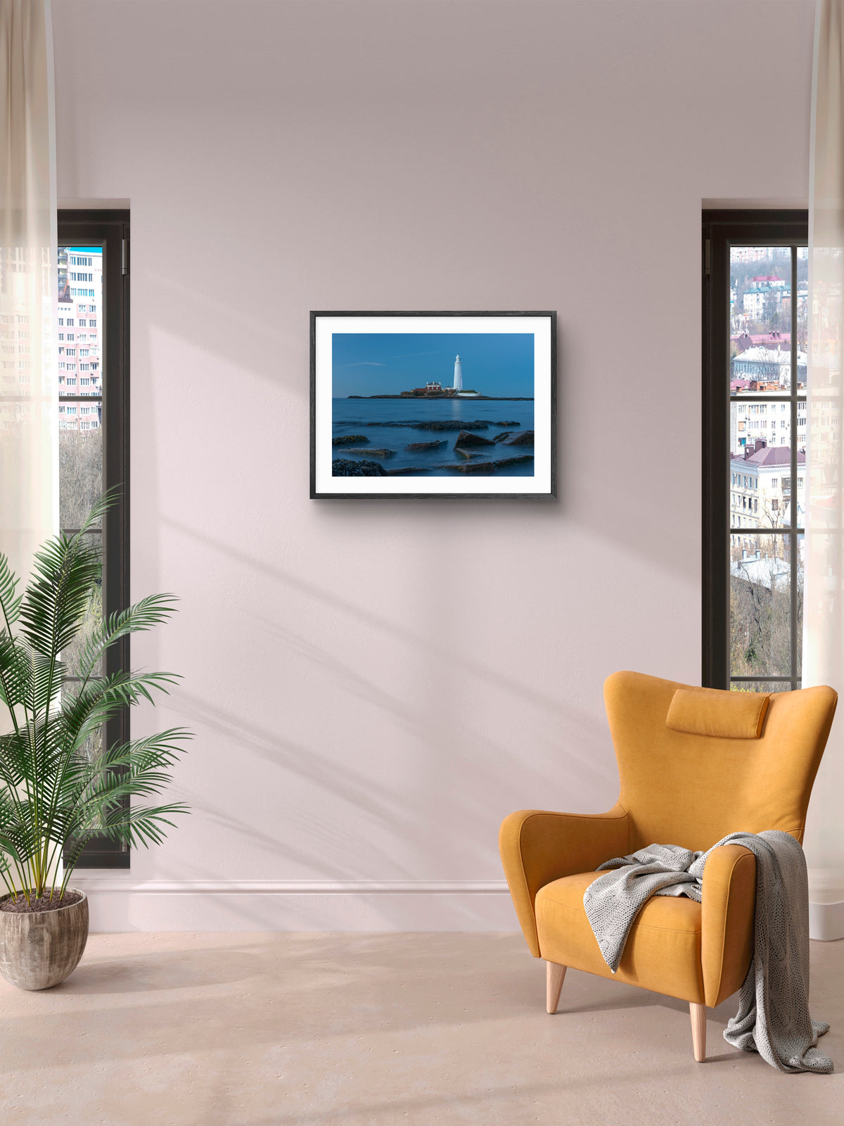 St Mary's Lighthouse and Rocks - Blue Hour - Whitley Bay wall art displayed in a styled room setting.