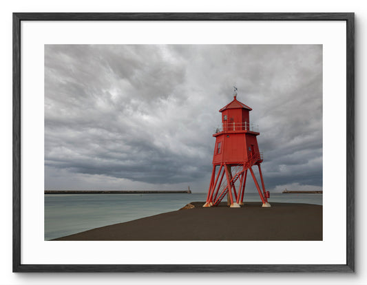 Herd Groyne Lighthouse - Grey Skies - South Shields shown as a framed photographic print.