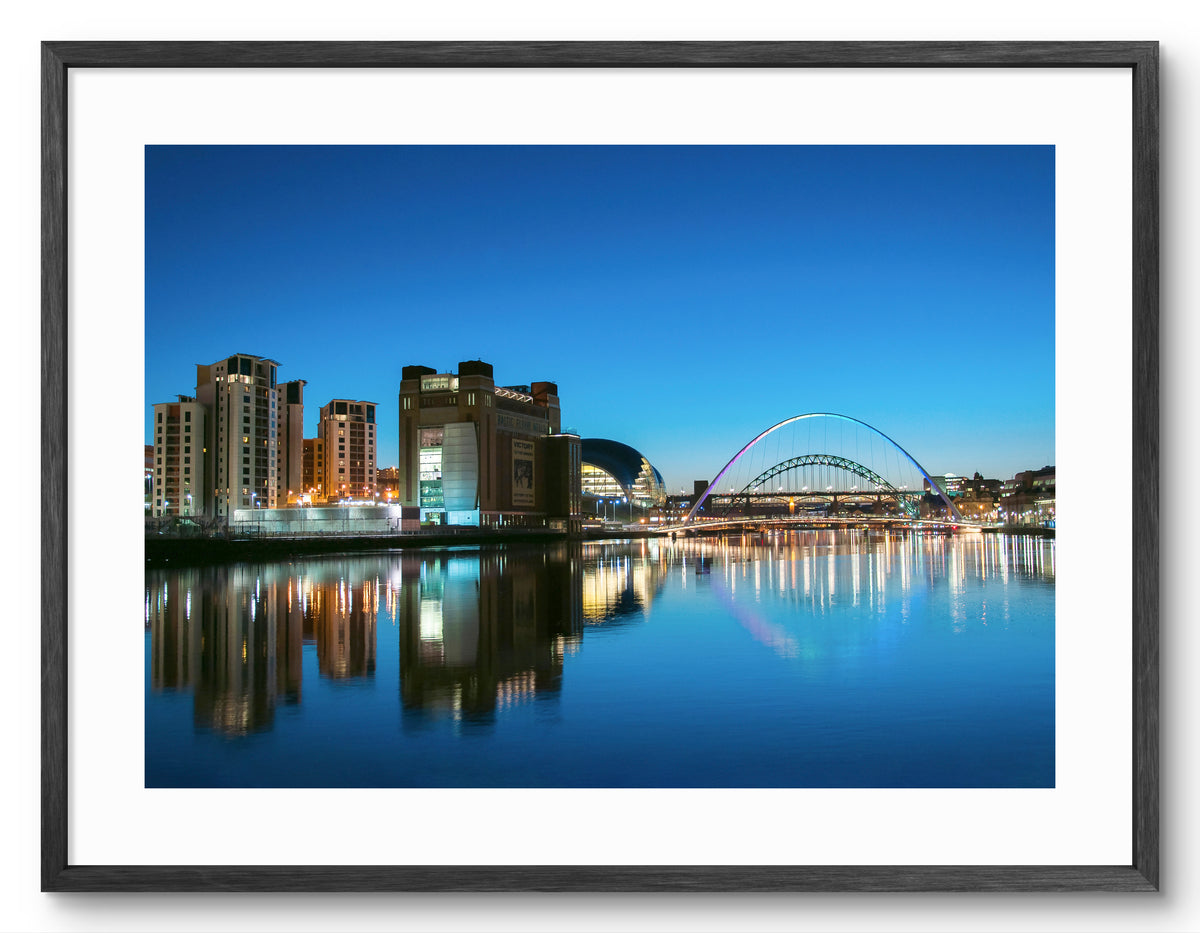 The Quayside and Millennium Bridge - Blue Hour - Newcastle - Gateshead shown as a framed photographic print.