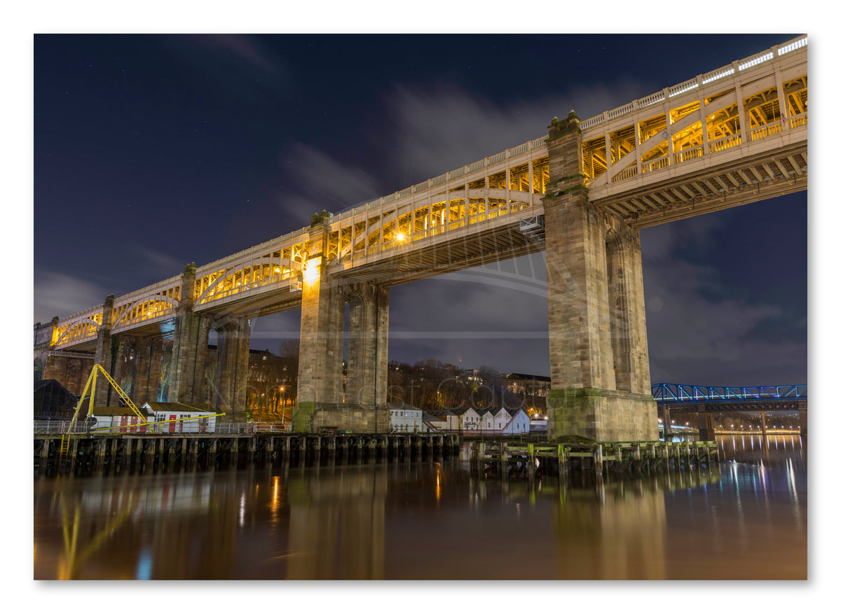 High Level Bridge - Lit up at Night - Newcastle - Gateshead shown as a canvas print.