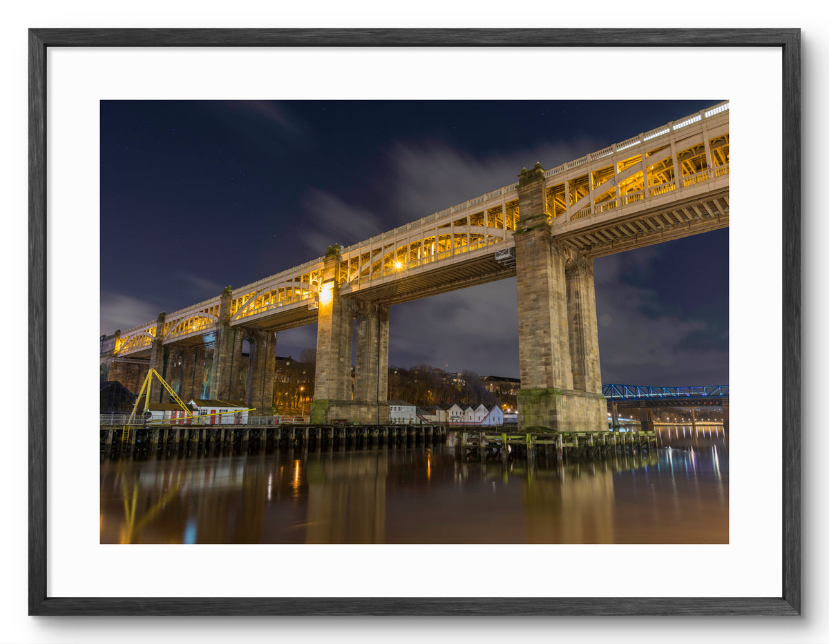 High Level Bridge - Lit up at Night - Newcastle - Gateshead shown as a framed photographic print.
