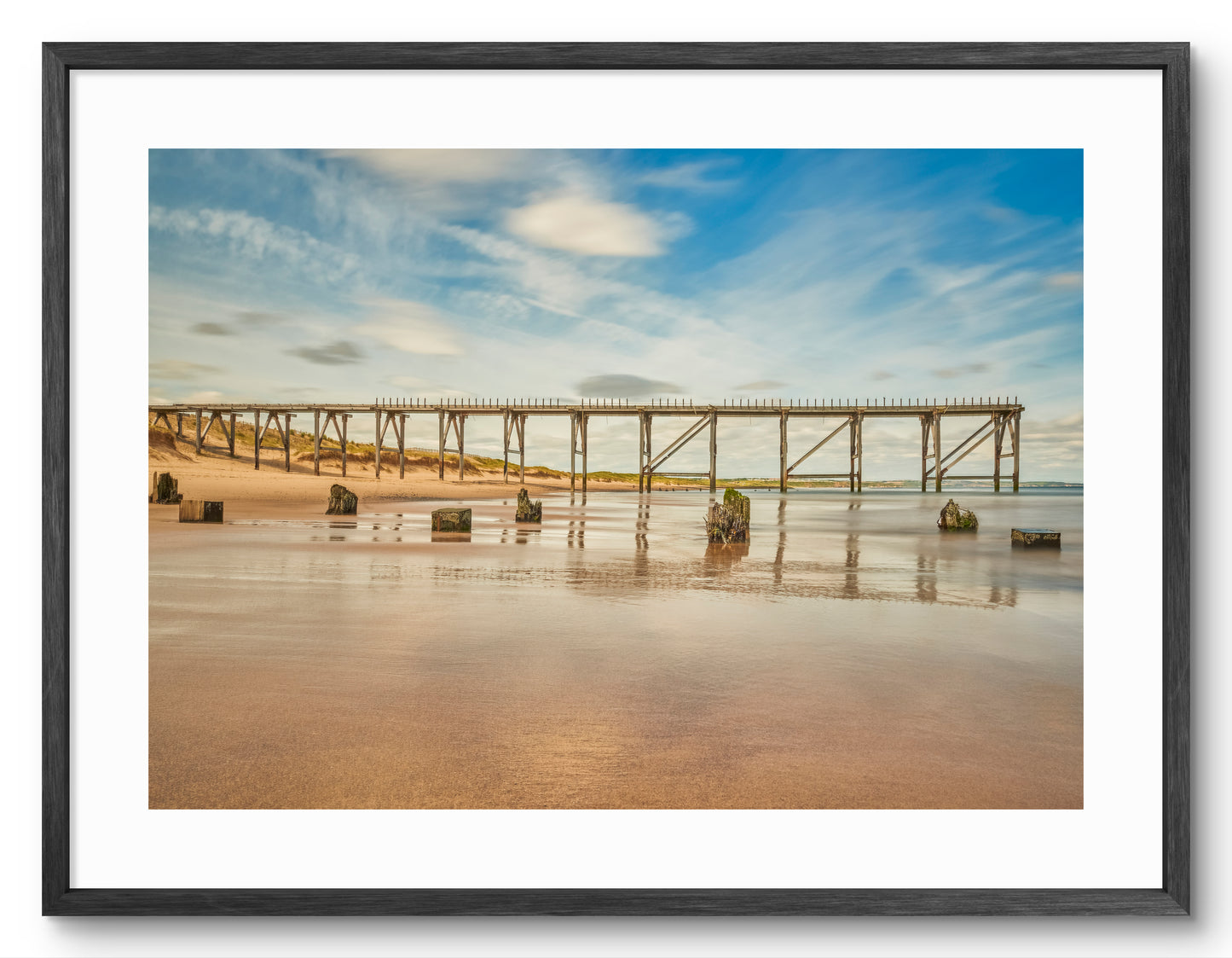 Steetley Pier and Beach - Hartlepool shown as a framed photographic print.