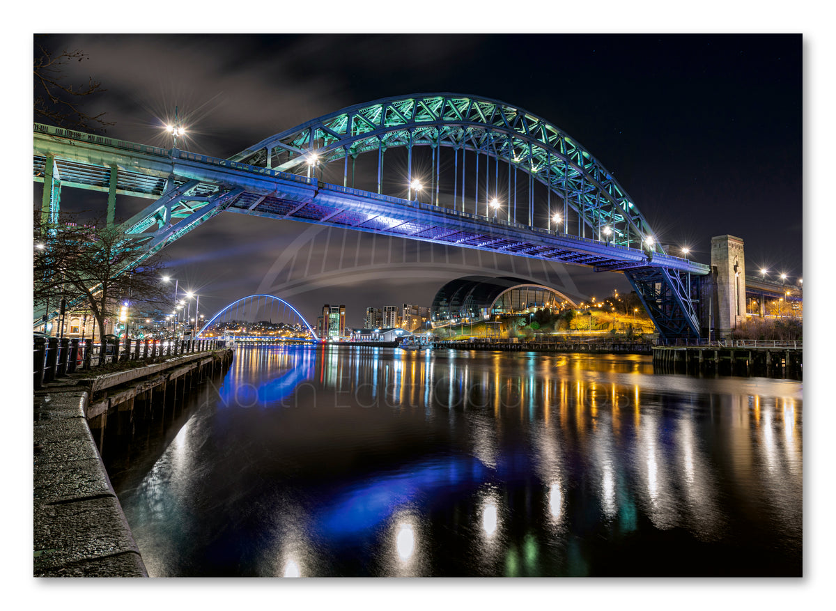 Tyne Bridge & Quayside at Night - River Tyne Reflections shown as a canvas print.