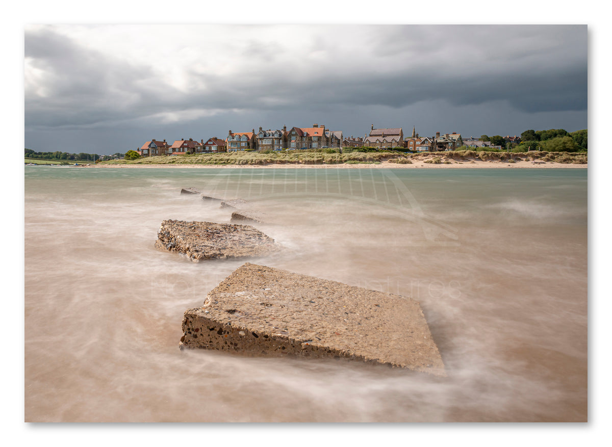 Canvas print of an approaching storm over the River Aln at Alnmouth in Northumberland.