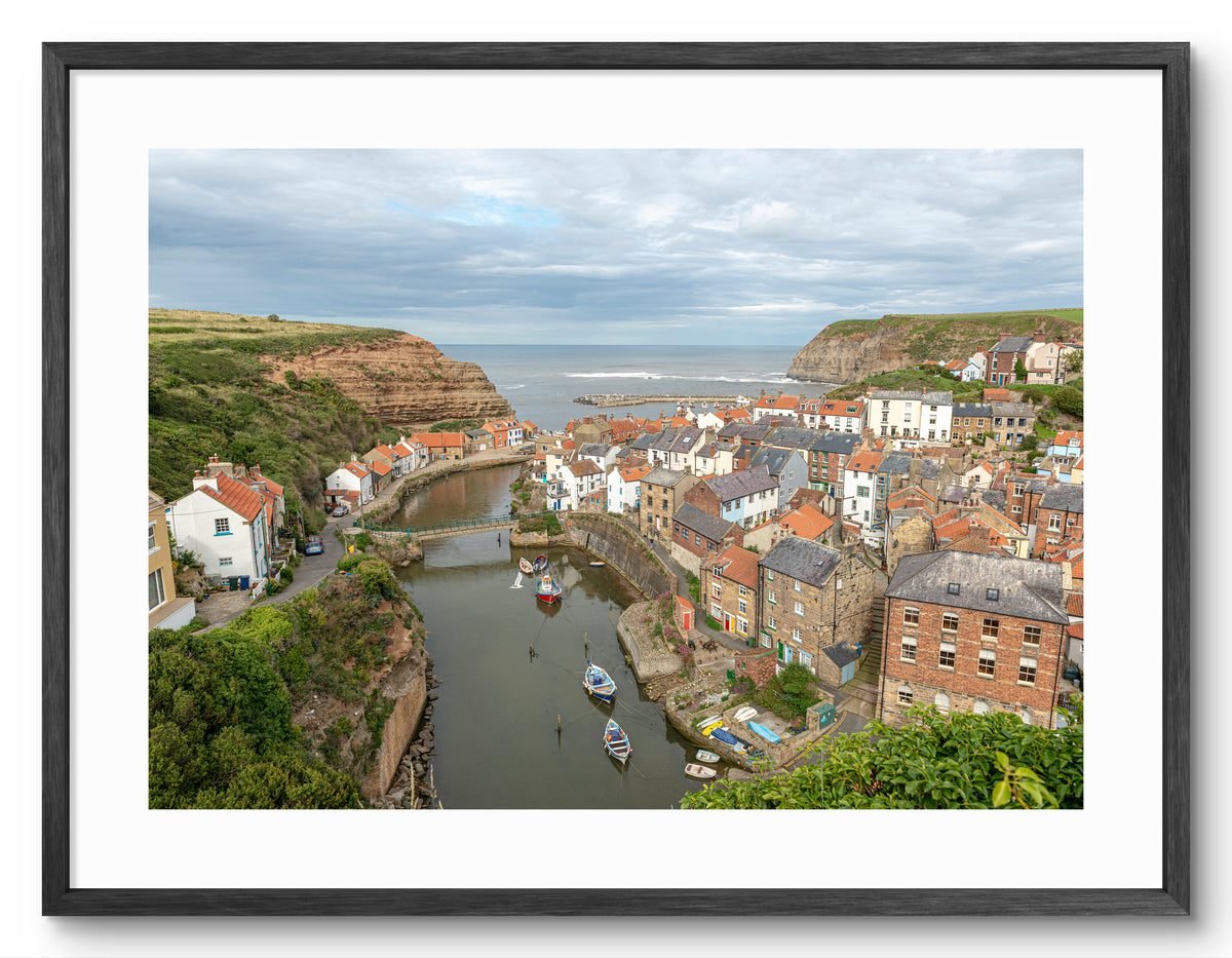 Staithes - Fishing Village - North Yorkshire shown as a framed photographic print.