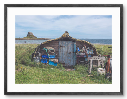 Holy Island Boat Shed - Lindisfarne Castle - Northumberland shown as a framed photographic print.