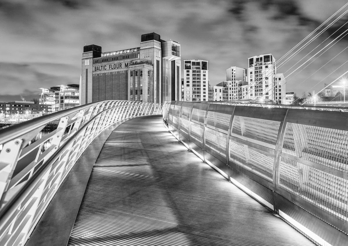 Black and white photograph of the Gateshead Millennium Bridge and BALTIC Centre for Contemporary Art.