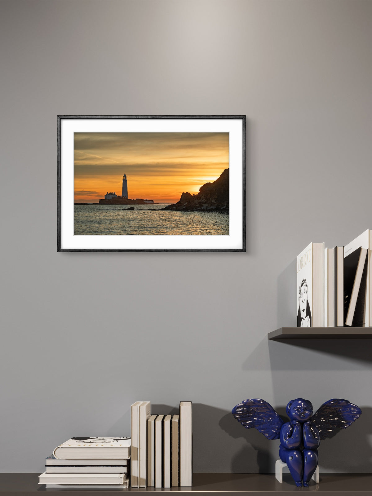 St Mary’s Lighthouse sunrise wall art displayed in a styled room setting.