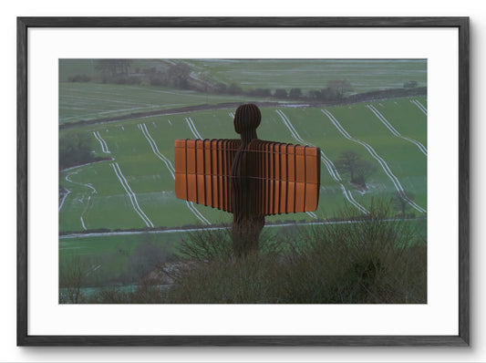 Angel of The North overlooking a green field