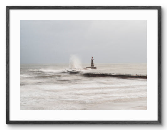 Roker Pier - Stormy Seas - Sunderland shown as a framed photographic print.