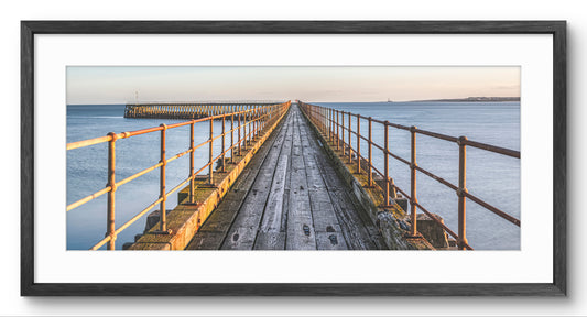 Blyth South Pier panoramic print — black frame and white mount