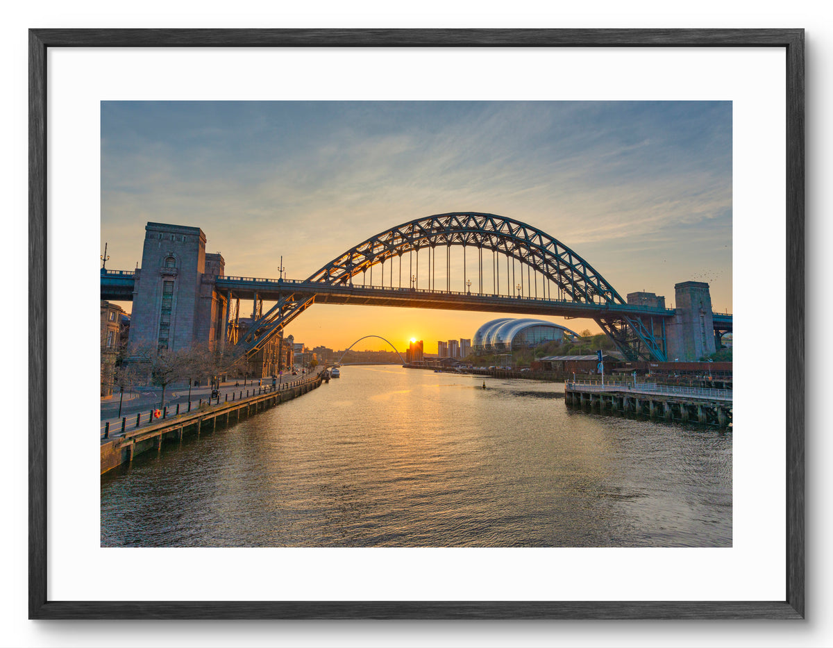 Tyne Bridge and River Tyne Sunrise - Newcastle - Gateshead shown as a framed photographic print.