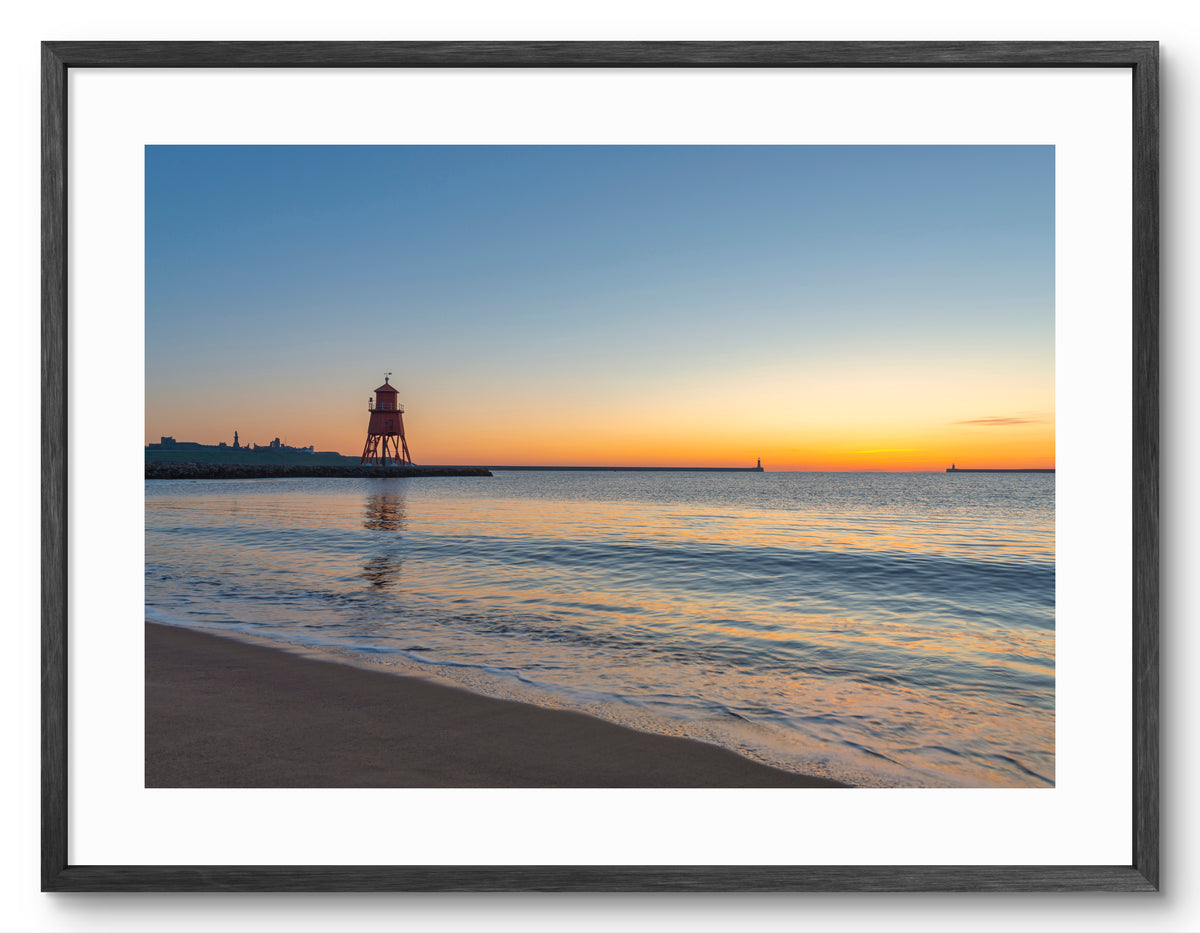 Herd Groyne Lighthouse - Sandhaven Beach - Sunrise - South Shield shown as a framed photographic print.