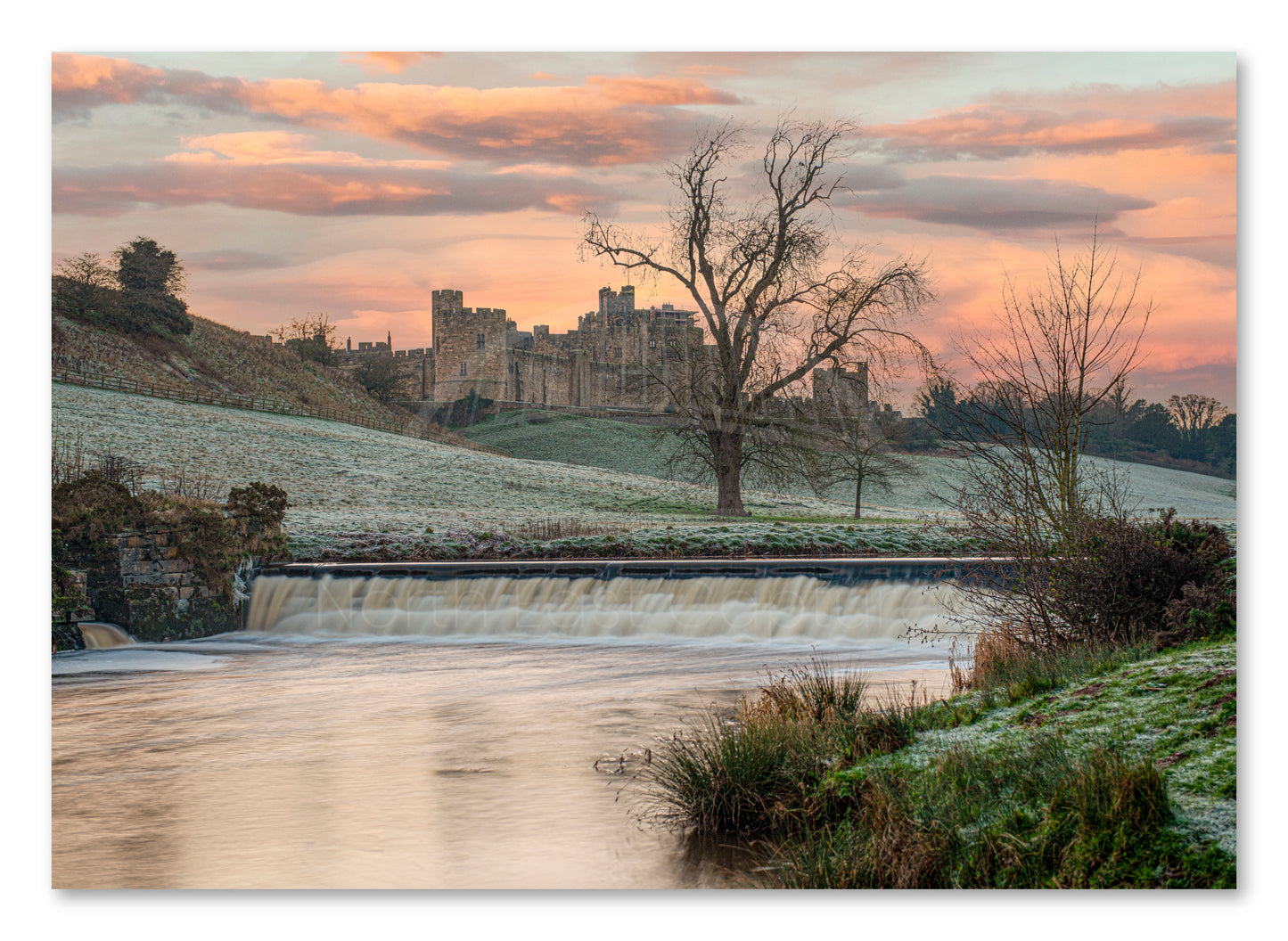 Canvas print of Alnwick Castle in winter in Northumberland.