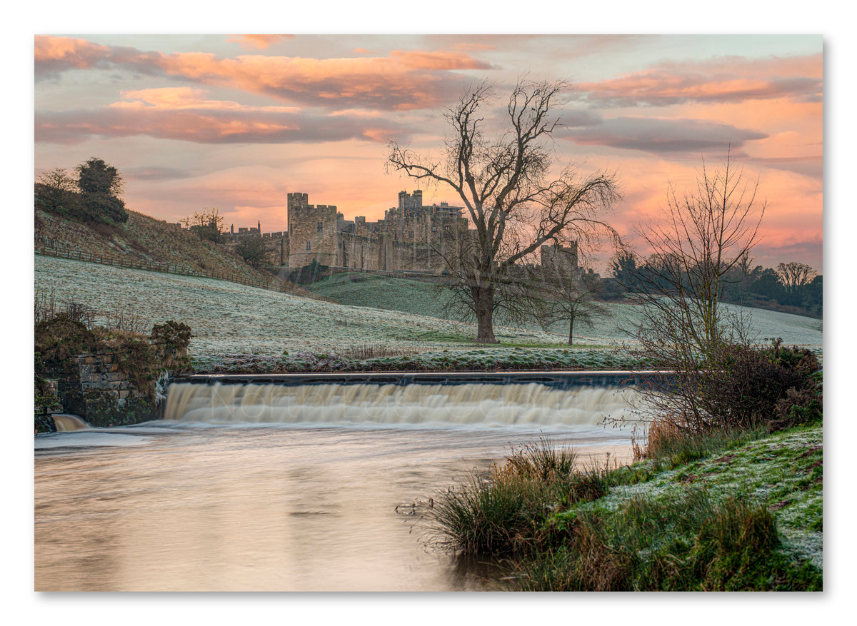Canvas print of Alnwick Castle in winter in Northumberland.