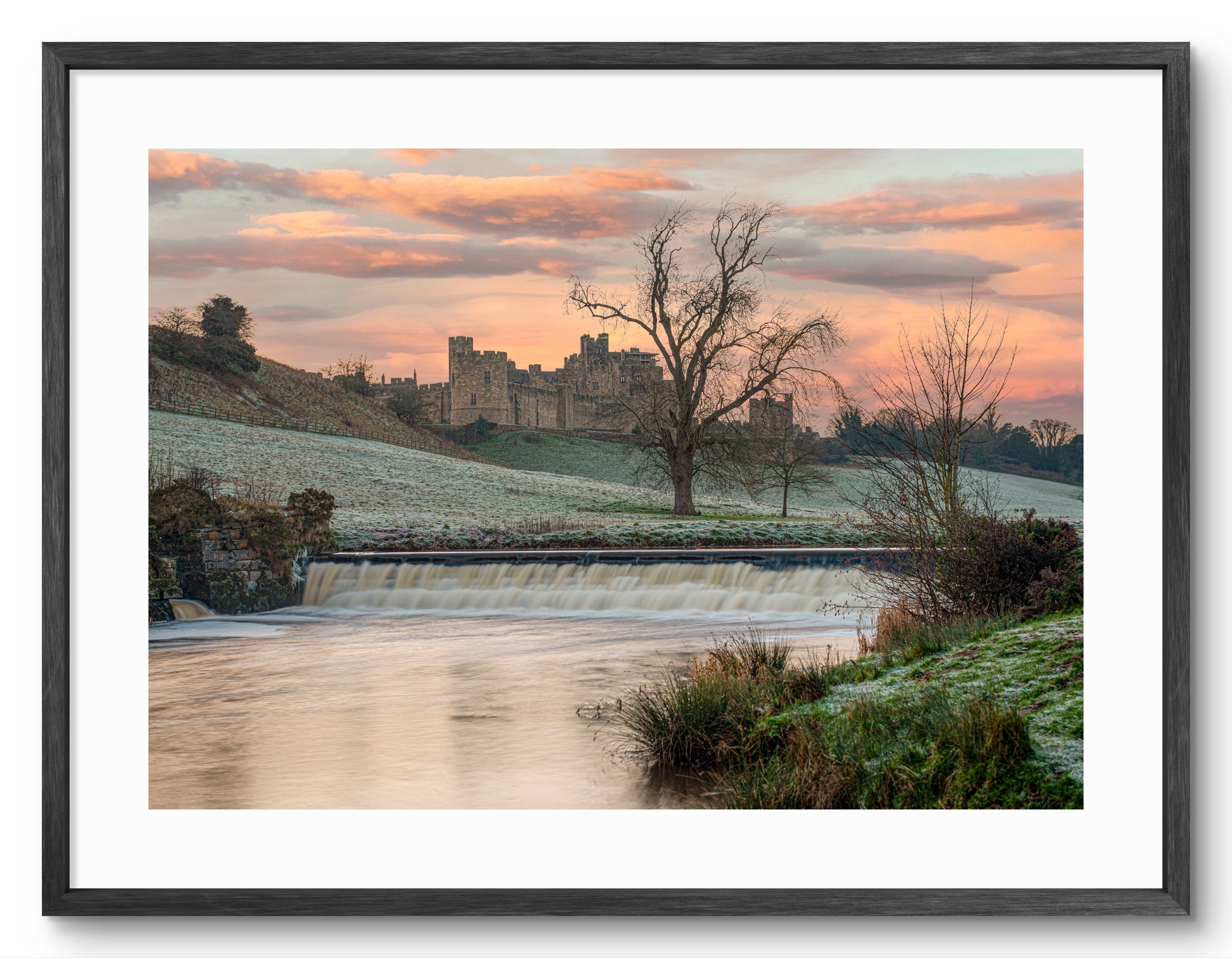 Framed winter print of Alnwick Castle in Northumberland.
