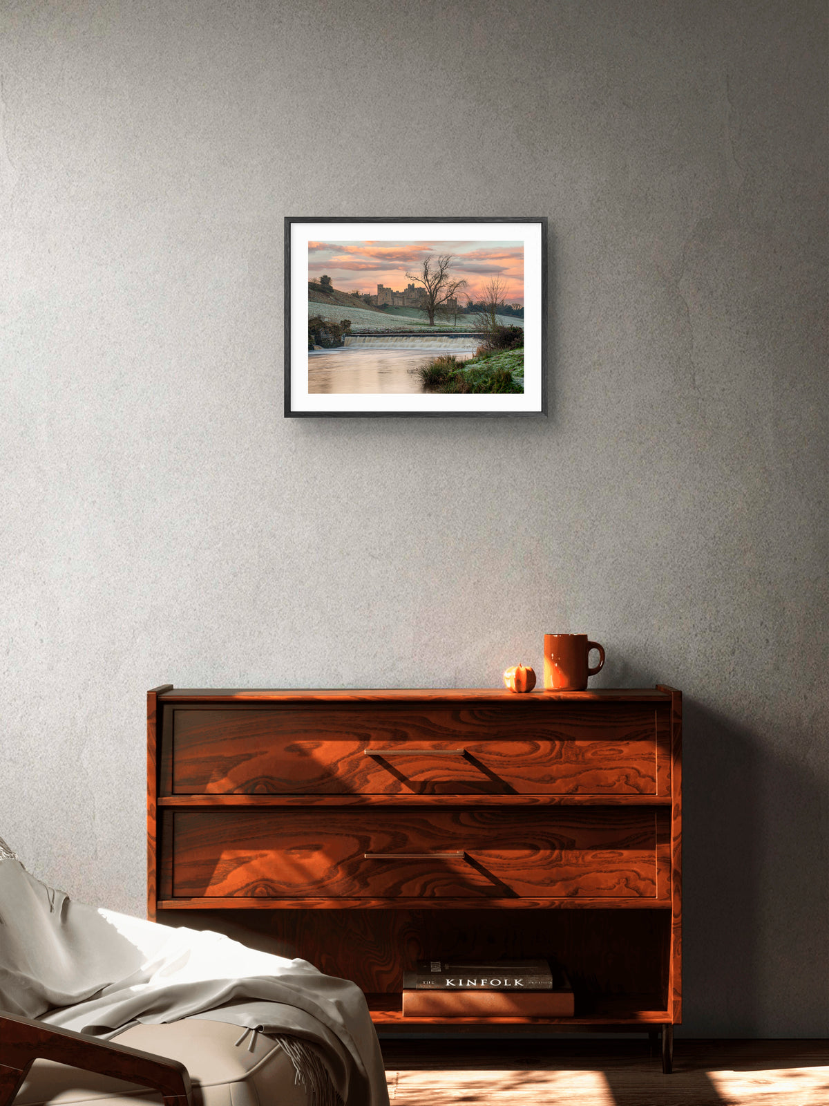 Alnwick Castle winter wall art displayed above a sideboard in a room setting.