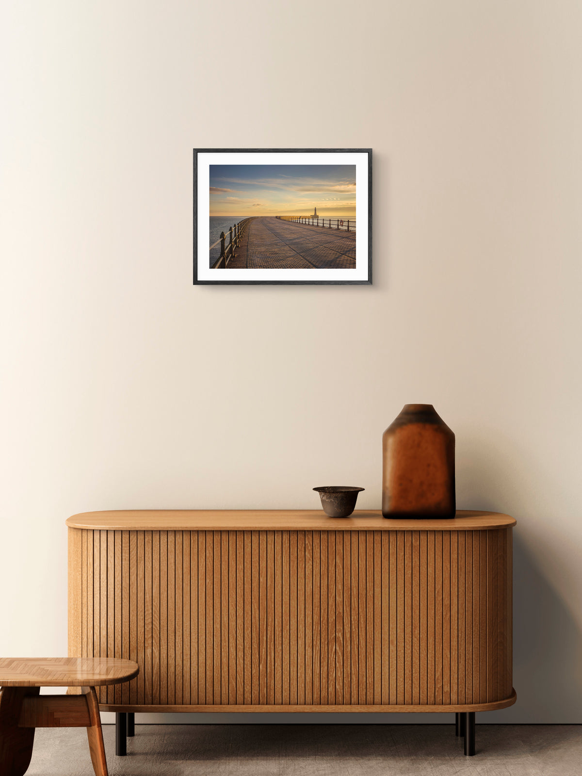 Roker Pier Sunrise - Roker - Sunderland wall art displayed in a styled room setting.