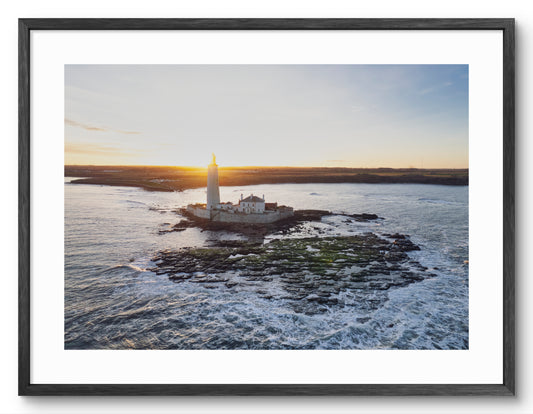 St Mary's Lighthouse - Drone Shot Sunset - Whitley Bay shown as a framed photographic print.