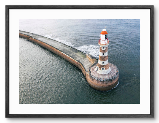 Roker Lighthouse and Pier - Drone Shot - Sunderland shown as a framed photographic print.