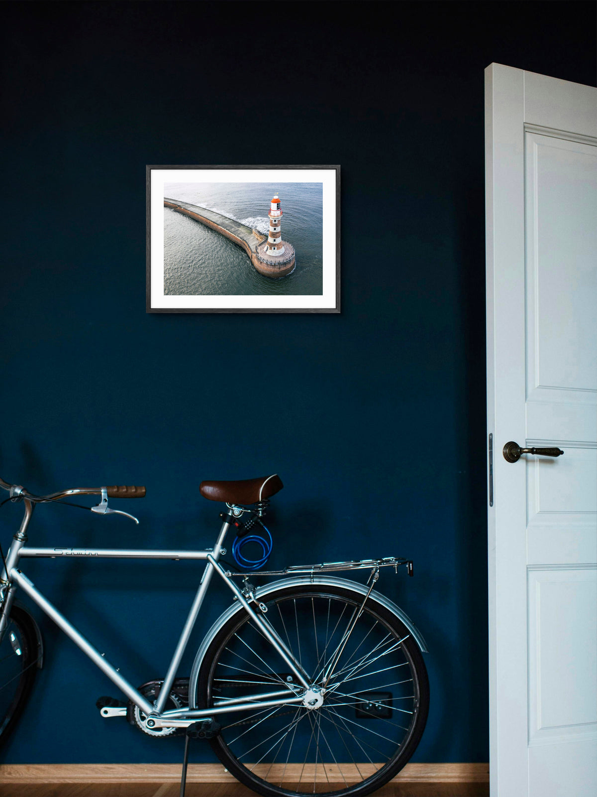 Roker Lighthouse and Pier - Drone Shot - Sunderland wall art displayed in a styled room setting.