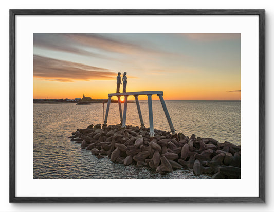 The Couple - Newbiggin By The Sea - Sunrise - Northumberland shown as a framed photographic print.