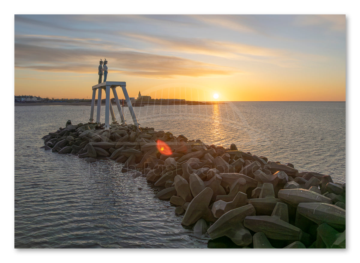 The Couple - Newbiggin By The Sea - Break Water - Sunrise shown as a canvas print.