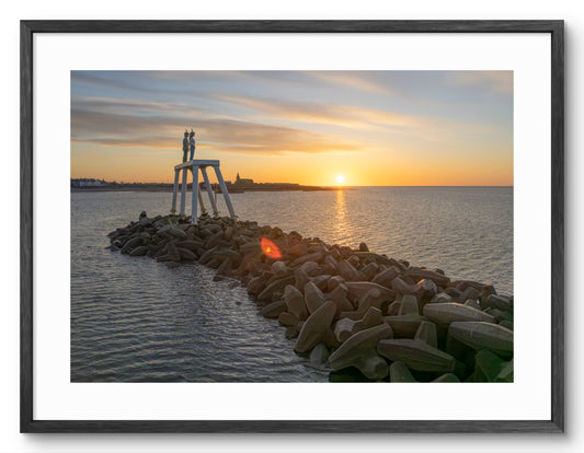 The Couple - Newbiggin By The Sea - Break Water - Sunrise shown as a framed photographic print.