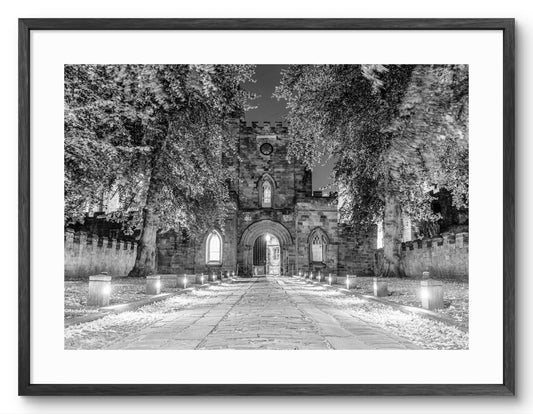 Durham Castle Gatehouse - Durham - Black and White shown as a framed photographic print.