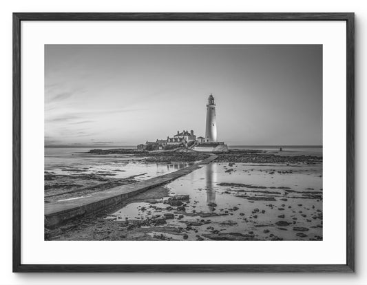 St Mary's Lighthouse and Causeway - Whitley Bay - Black and White shown as a framed photographic print.