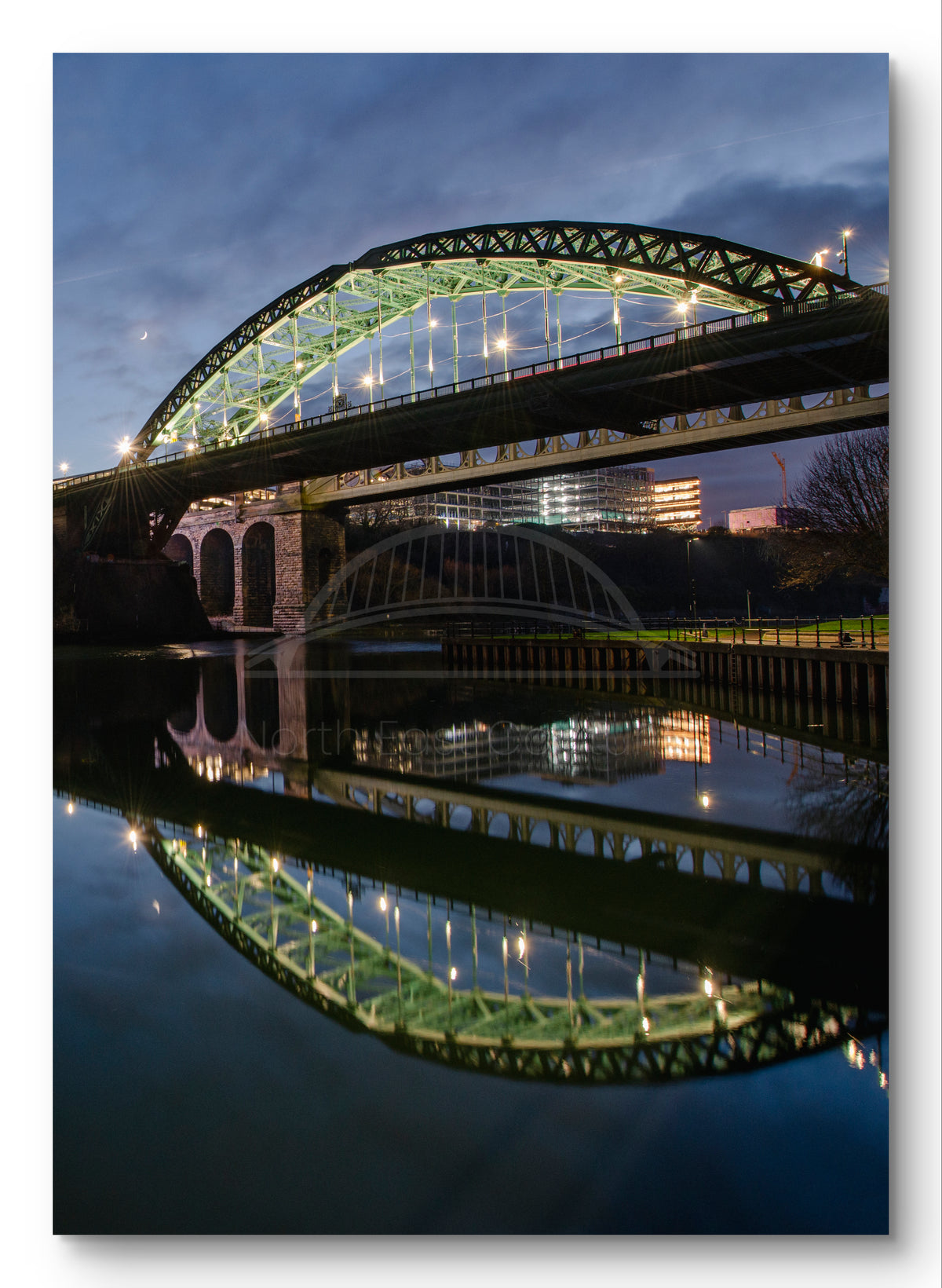 Wearmouth Bridge - Reflecting on a Still River Wear - Sunderland shown as a canvas print.