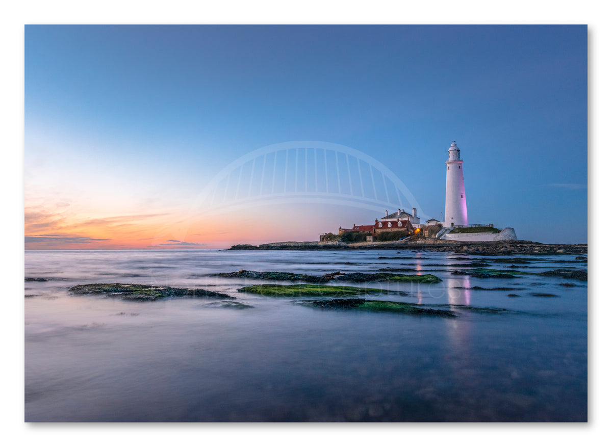 St Mary's Lighthouse - Sunset Sky - Whitley Bay shown as a canvas print.