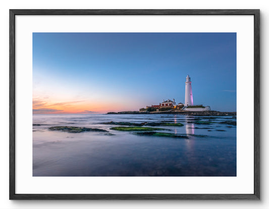 St Mary's Lighthouse - Sunset Sky - Whitley Bay shown as a framed photographic print.