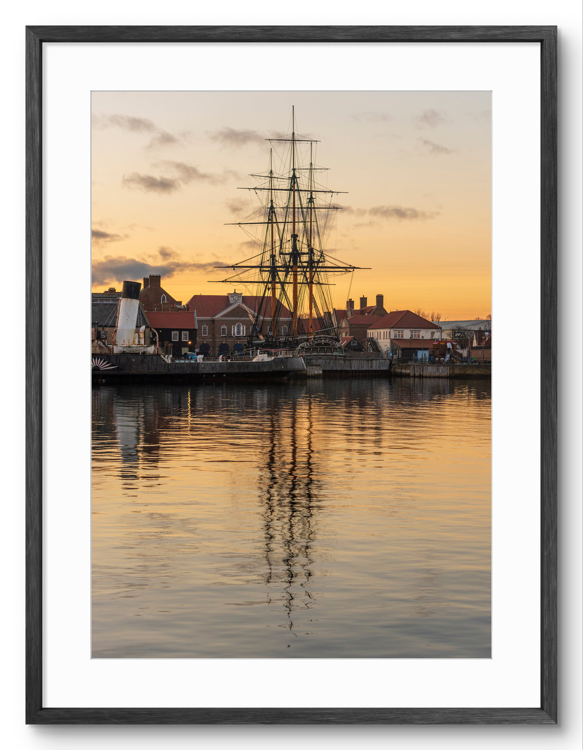 HMS Trincomalee - Sunset - Royal Quay - Hartlepool shown as a framed photographic print.
