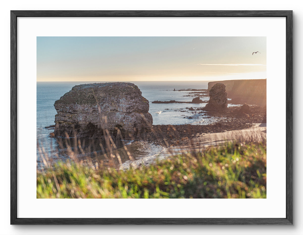 Marsden Rock and Bay - Sunrise - Marsden - South Tyneside shown as a framed photographic print.