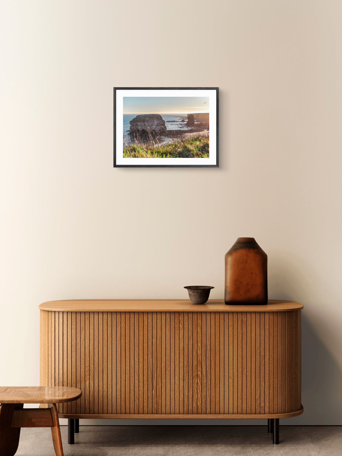 Marsden Rock and Bay - Sunrise - Marsden - South Tyneside wall art displayed in a styled room setting.