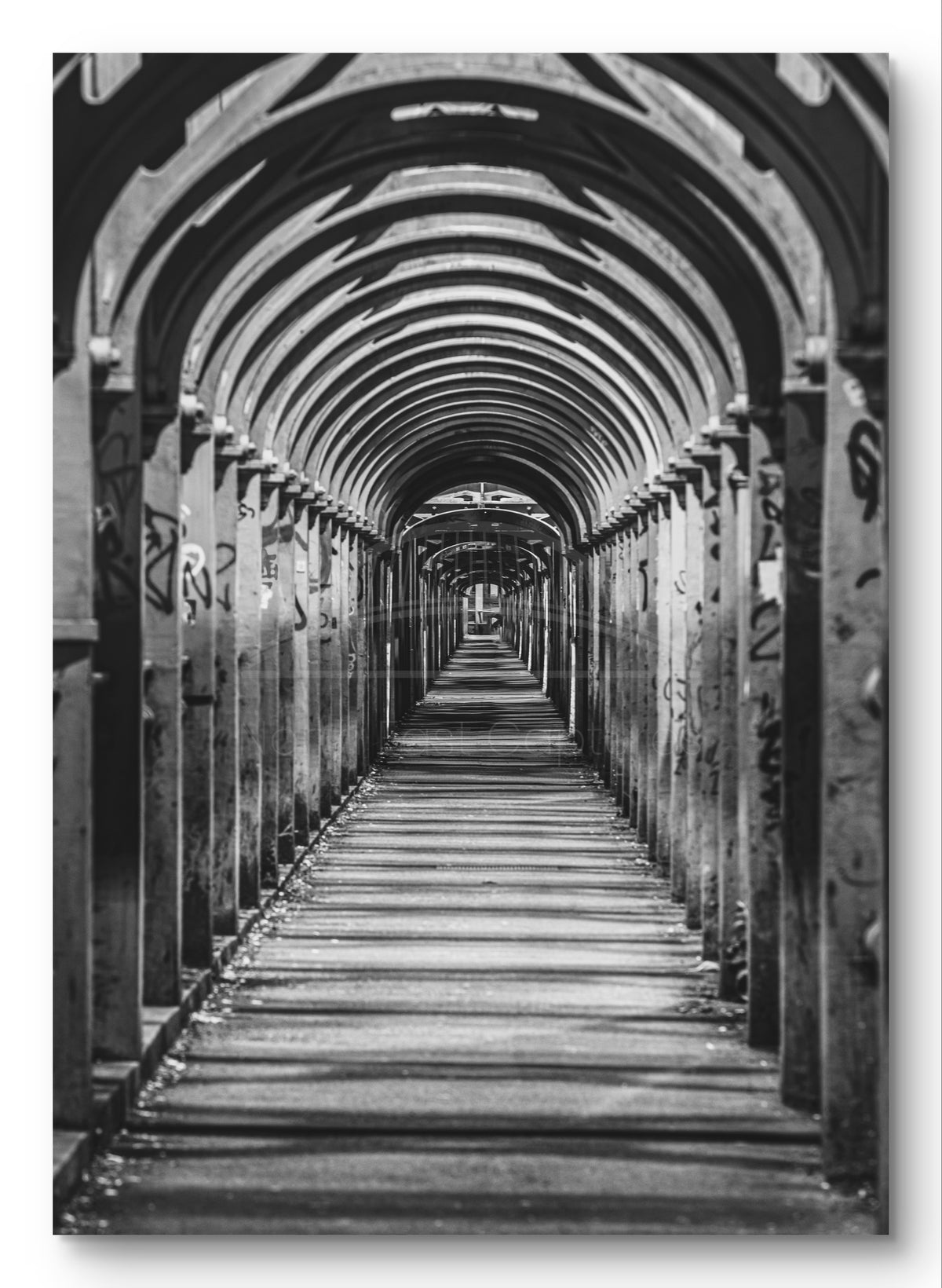 High Level Bridge Walkway Arches - Newcastle - Gateshead - Black and White shown as a canvas print.