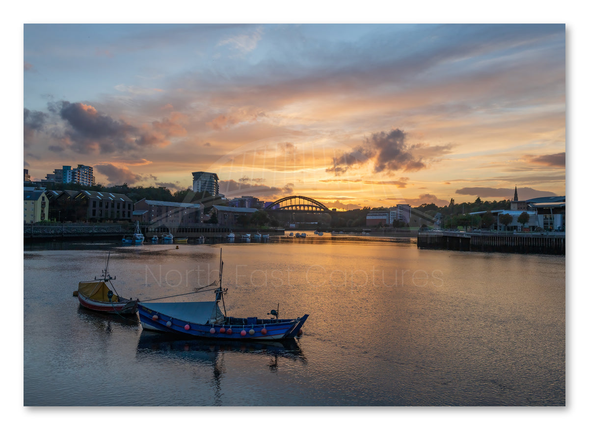Wearmouth Bridge - Boats on the Wear - Sunset - Sunderland shown as a canvas print.