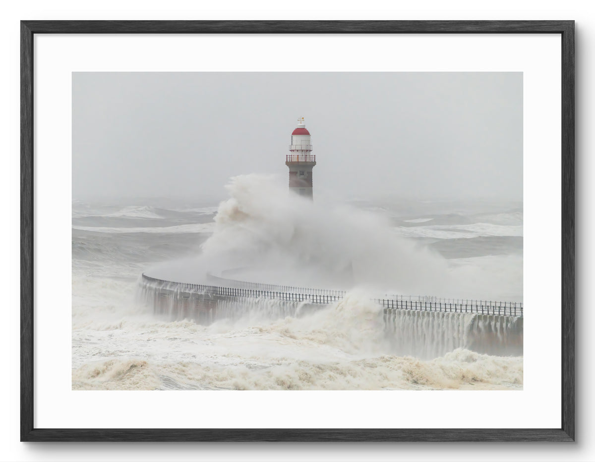 Roker Pier Lighthouse - Storm Babet Waves - Sunderland shown as a framed photographic print.