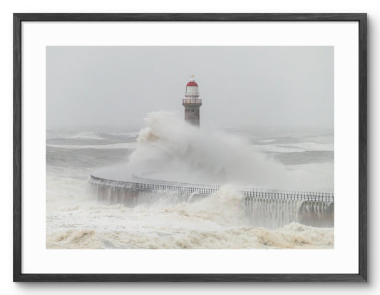 Roker Pier Lighthouse - Storm Babet Waves - Sunderland shown as a framed photographic print.