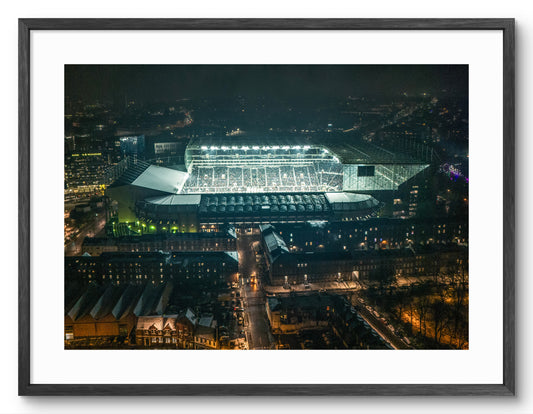 St James Park - Night Shot of Stadium - Newcastle shown as a framed photographic print.