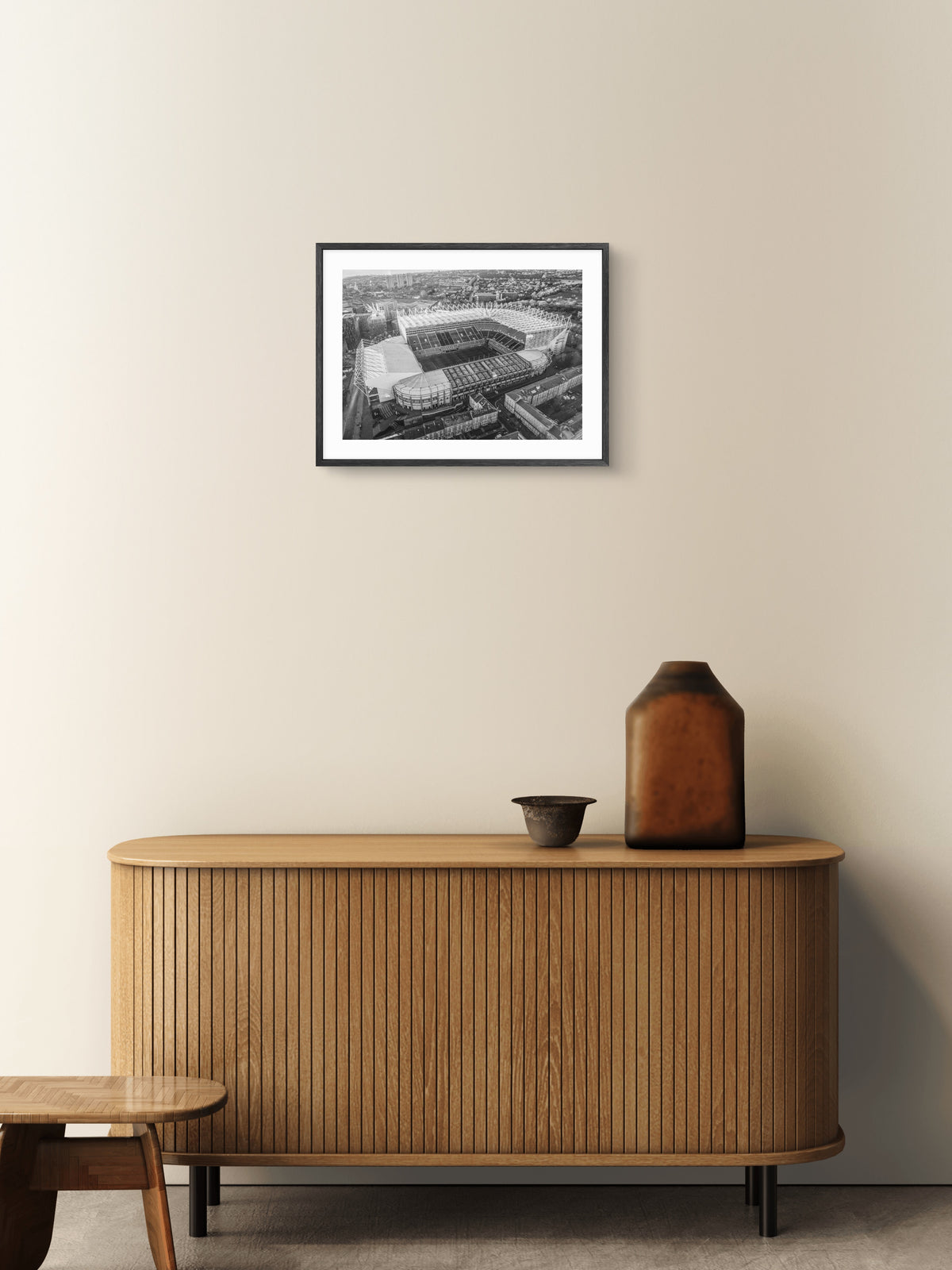 St James Park - Home of Newcastle United - Black and White wall art displayed in a styled room setting.