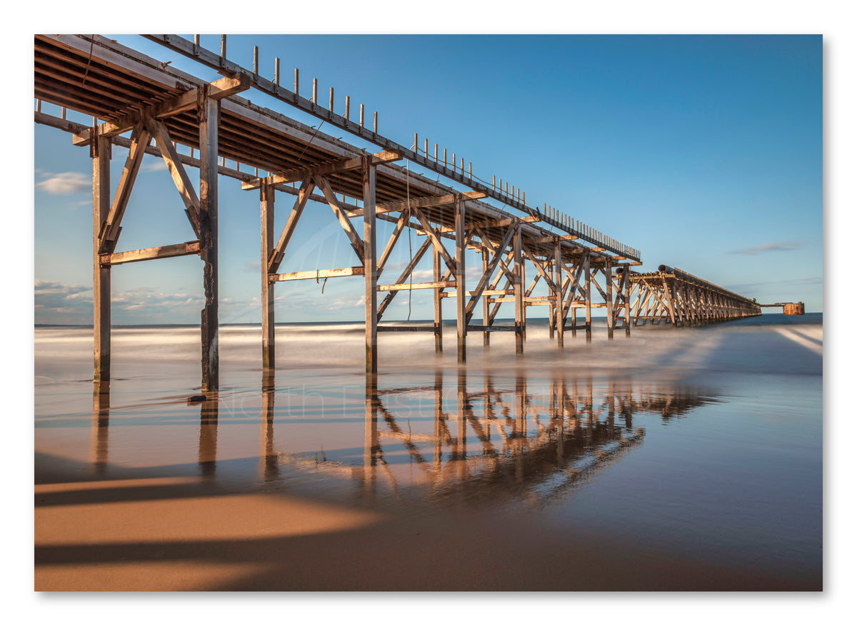 Steetley Pier - Cross Section - Water Reflections - Hartlepool - Teesside shown as a canvas print.